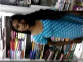 Indian youthful Student Relaxed on Inwards Of book store - Wowmoyback
